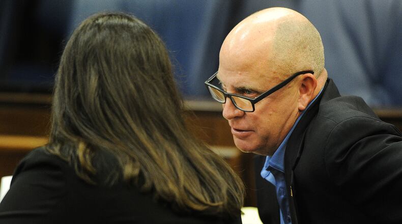 Former Montgomery County assistant prosecutor John C. Amos appeared in Montgomery County Common Pleas Court on Thursday, July 13, 2023. His trial is set for Oct. 10. MARSHALL GORBY\STAFF