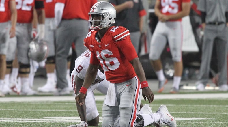 Ohio State’s J.T. Barrett gets up after being tackled by Oklahoma on Saturday, Sept. 9, 2017, at Ohio Stadium in Columbus. David Jablonski/Staff
