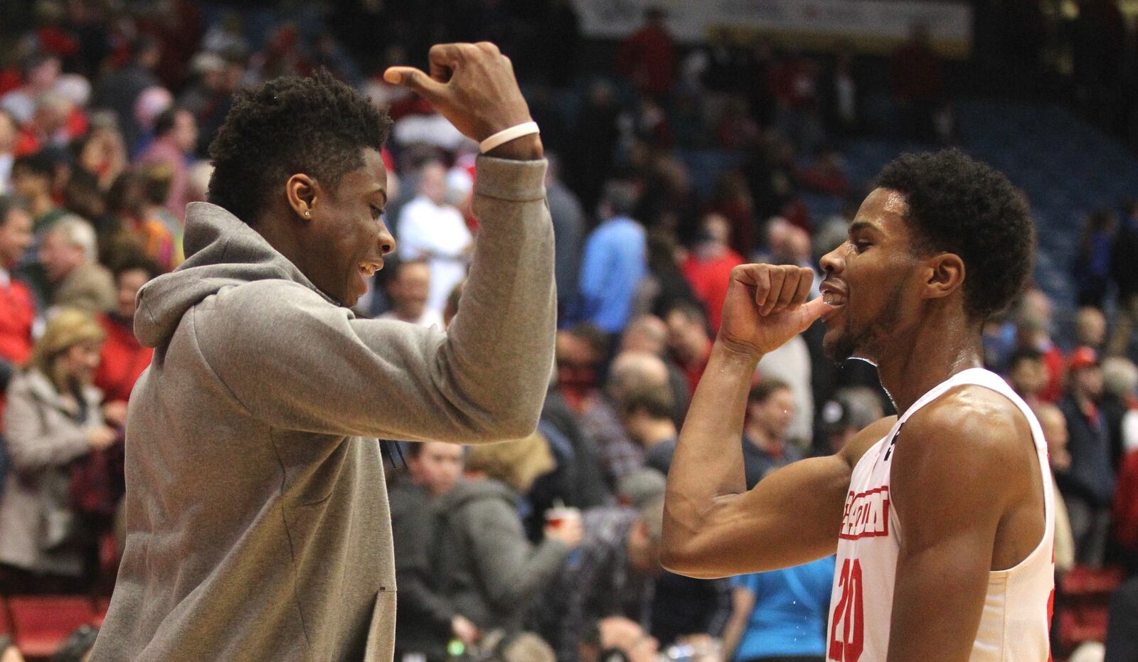 Dayton’s Kostas Antetokounmpo and Xeyrius Williams celebrate a victory over St. Joseph’s on Tuesday at UD Arena. David Jablonski/Staff