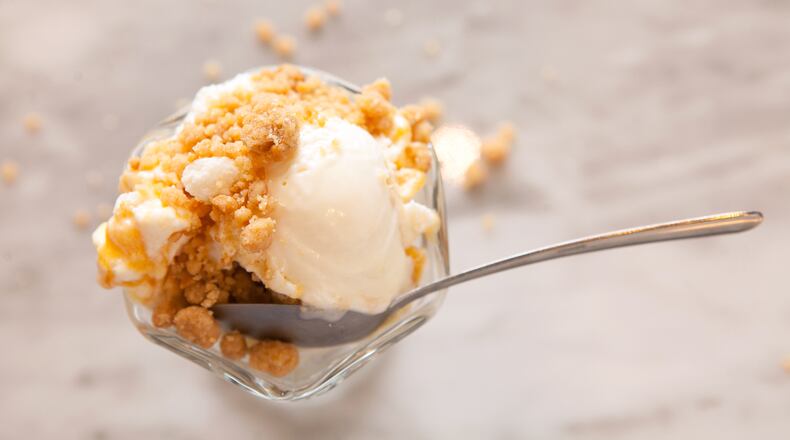 Cream Biscuits with Peach Jam Ice Cream topped with Honey Corn Bread Gravel (styling by Jeni Britton Bauer ) (Photography by Renee Brock/Contributed)