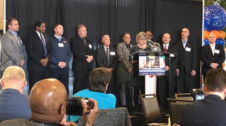 Superintendents of 11 of Montgomery County’s 16 school districts attended the 10th annual Kindergarten Readiness Summit, Friday, March 8, 2019 at Sinclair Community College. As Huber Heights Superintendent Sue Gunnell speaks, from left are Rob O’Leary (Vandalia-Butler), Richard Gates (Jefferson Twp.), Chad Wyen (Mad River), Greg Williams (New Lebanon), Tom Henderson (Centerville), Tony Thomas (Northmont), Tyrone Olverson (Trotwood), Dave Jackson (Northridge), Kyle Ramey (Oakwood) and David Vail (Miamisburg). JEREMY P. KELLEY / STAFF