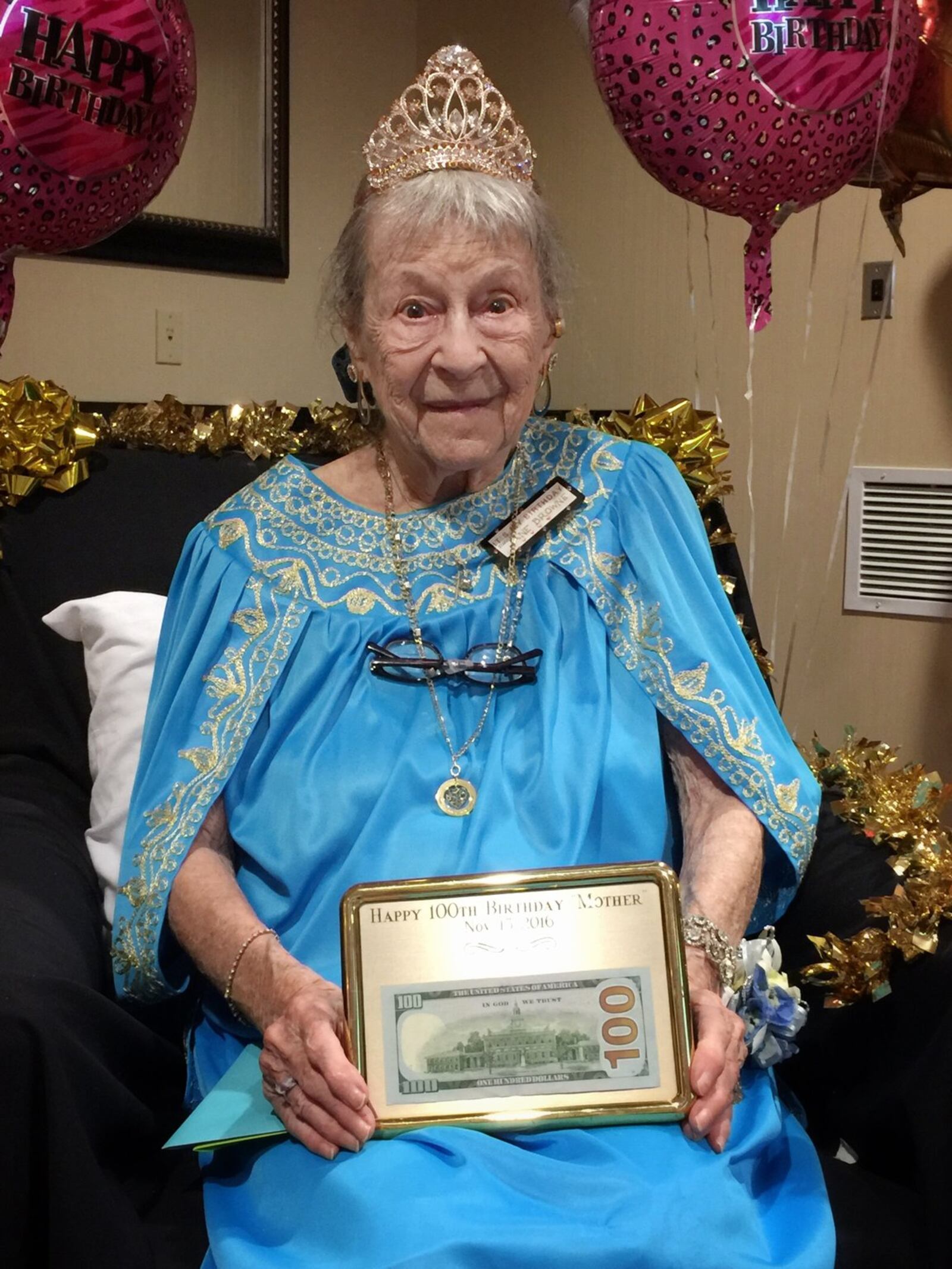 Jane Browne of Centerville attends a 100th birthday party in her honor. She was born on Nov. 15, 1916. CONNIE POST/STAFF