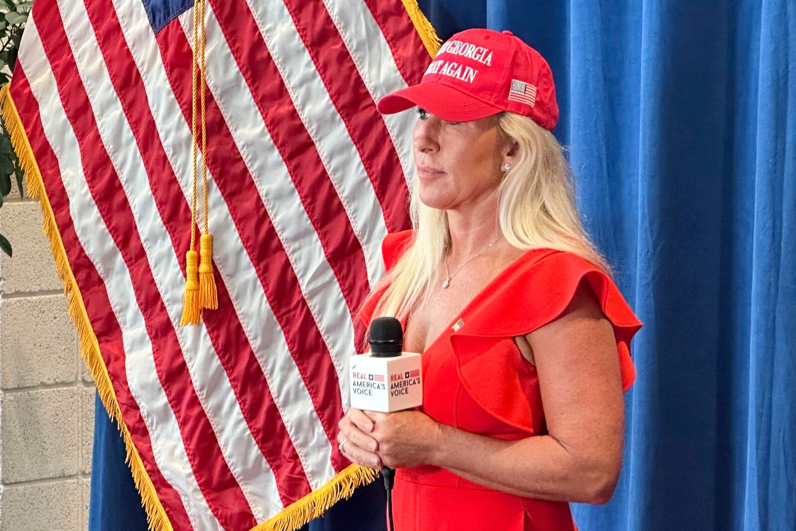U.S. Rep. Marjorie Taylor Greene, R-Ga., waits for a video interview at the Georgia Republican Convention in Dalton, Ga., Saturday, June 7, 2025. (AP Photo/Jeff Amy)