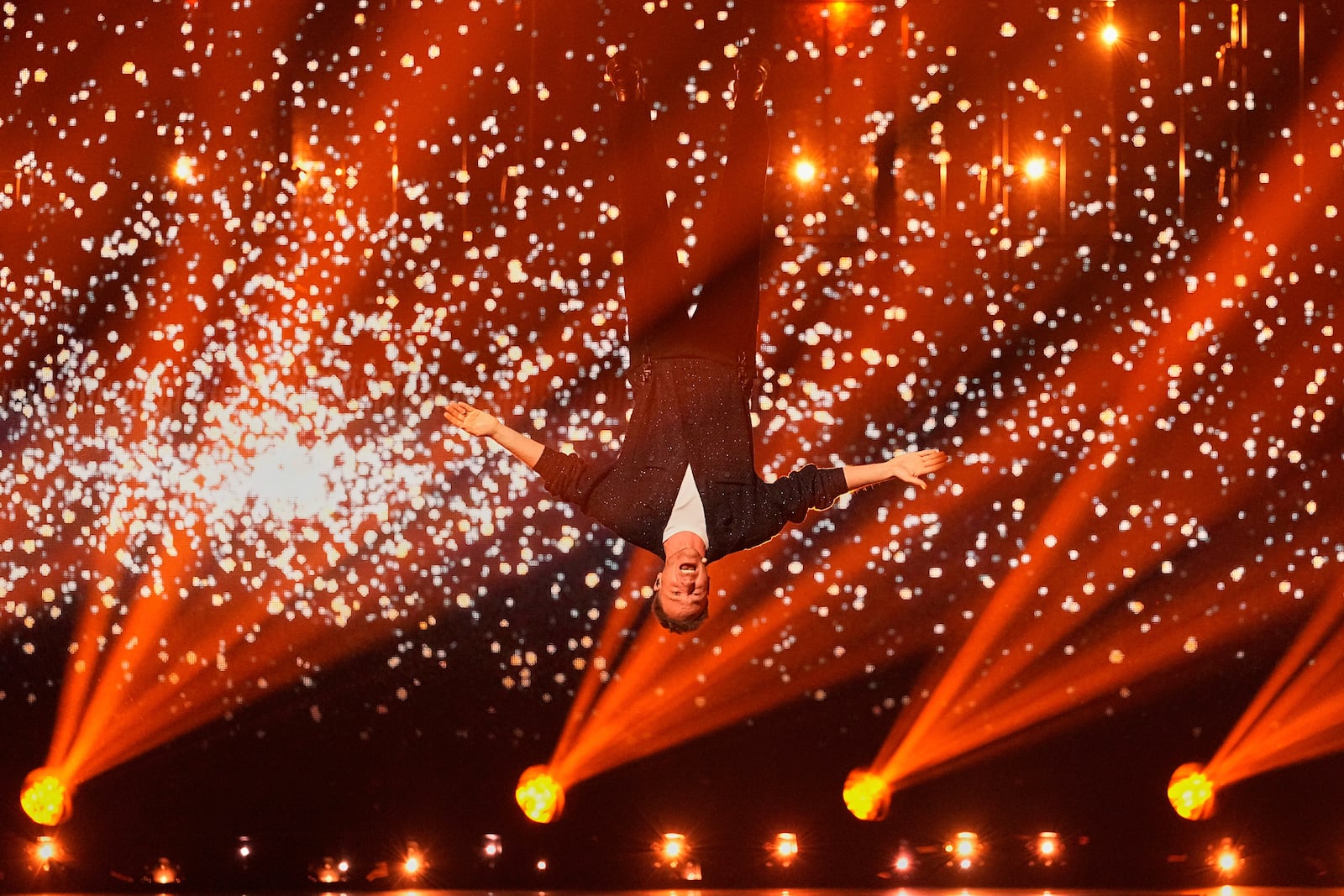 Klemen from Slovenia performs the song "How Much Time Do We Have Left" during the first semi-final of the 69th Eurovision Song Contest, in Basel, Switzerland, Tuesday, May 13, 2025. (AP Photo/Martin Meissner)
