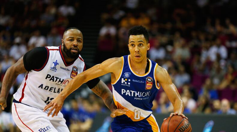 BRISBANE, AUSTRALIA - JANUARY 27:  Travis Trice of the Bullets takes on the defence during the round 16 NBL match between the Brisbane Bullets and the Adelaide 36ers at Brisbane Convention & Exhibition Centre on January 27, 2018 in Brisbane, Australia.  (Photo by Jason O'Brien/Getty Images)