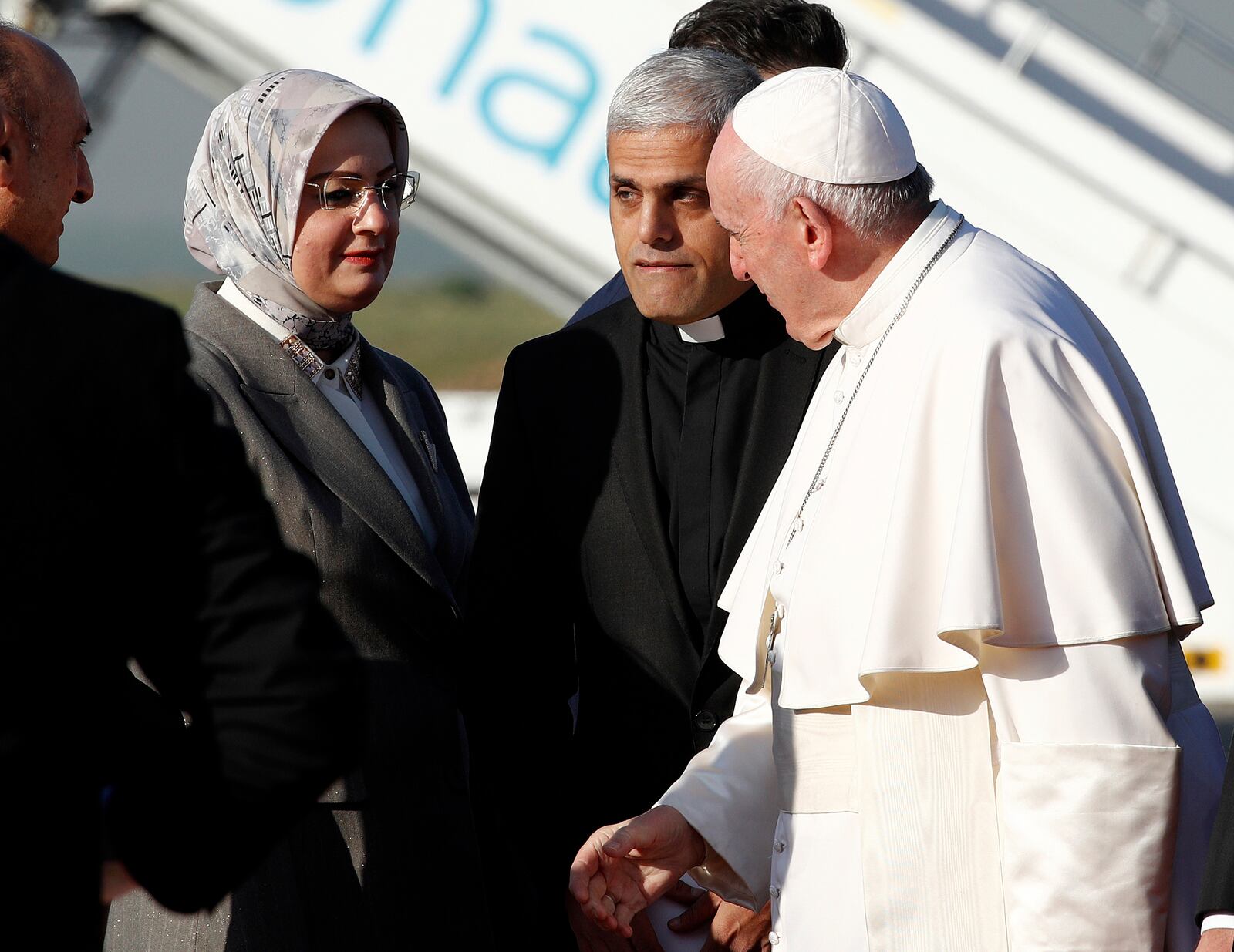 FILE - Pope Francis is welcomed as he arrives at Irbil airport, Iraq, March 7, 2021. (AP Photo/Hadi Mizban, file)