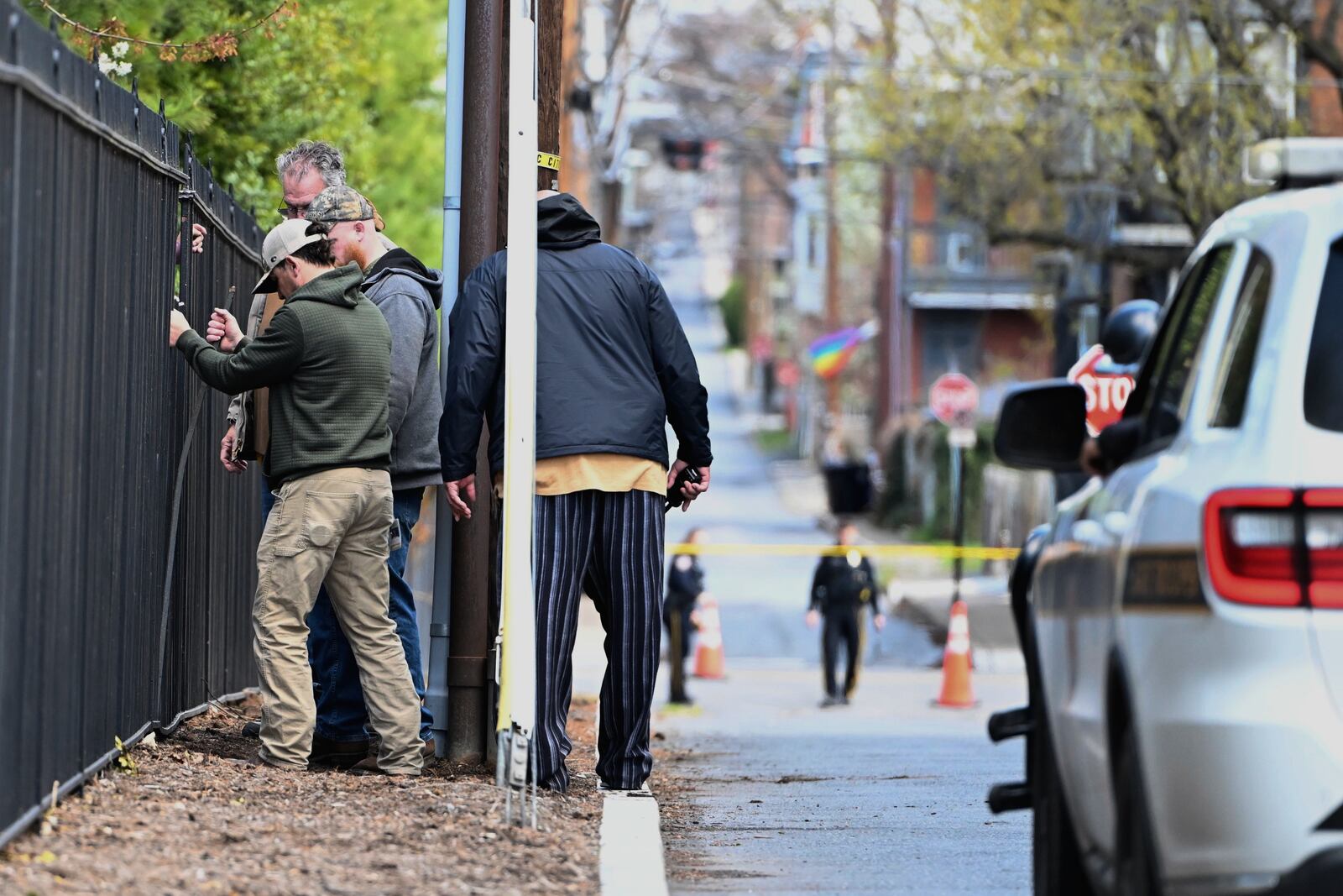 Investigators are on the scene after an overnight fire at the governor’s official residence on Sunday, April 13, 2025 in Harrisburg, Pa. (AP Photo/Marc Levy)