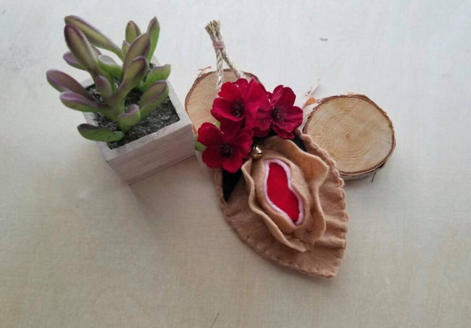 Heart Mercantile in Dayton's Oregon District  sells a variety of  "girl power" items with a twist. Items include vagina ornaments from Jacquelyn Marcella and Rebecca Mare Gonzalez.