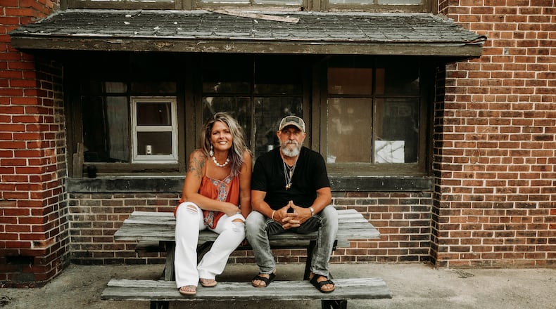 Angie (left) and Chris McConnell released their first album "Crazy World" late last year. The couple have written and composed 98 songs together since they met in 2013. CONTRIBUTED PHOTOS