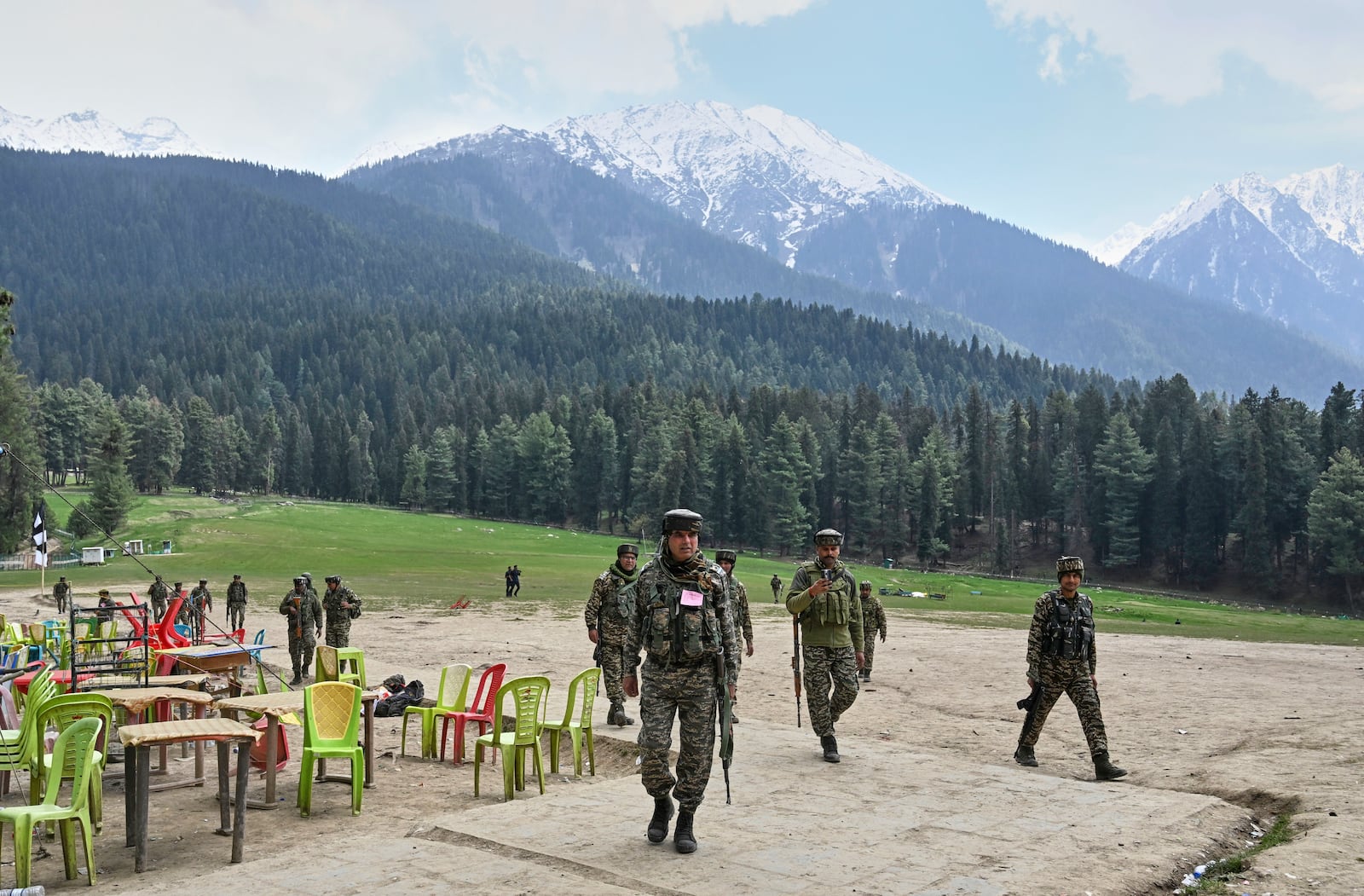 Indian security personnel inspect the site of a militant attack on tourists at Pahalgam in Indian controlled Kashmir, Wednesday, April 23, 2025. (AP Photo, File)