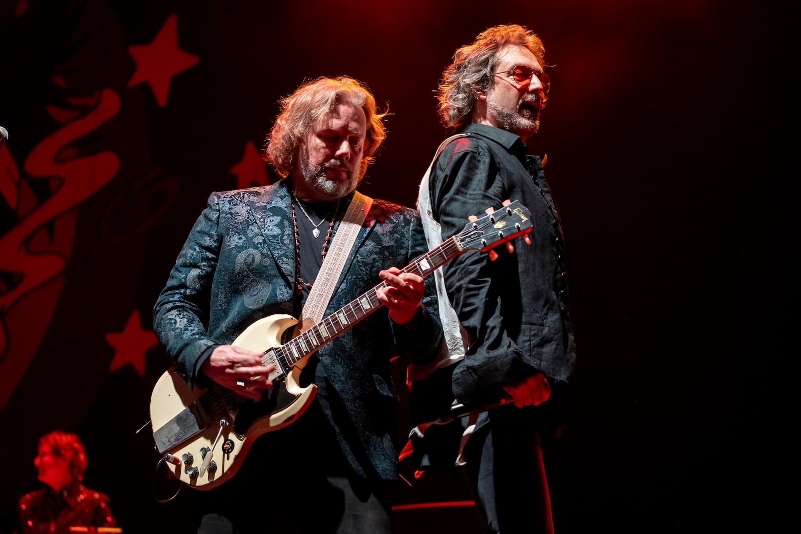 Rich Robinson, left, and Chris Robinson of The Black Crowes perform on Wednesday, June 18, 2025, in Highland Park, Ill. (Photo by Rob Grabowski/Invision/AP)