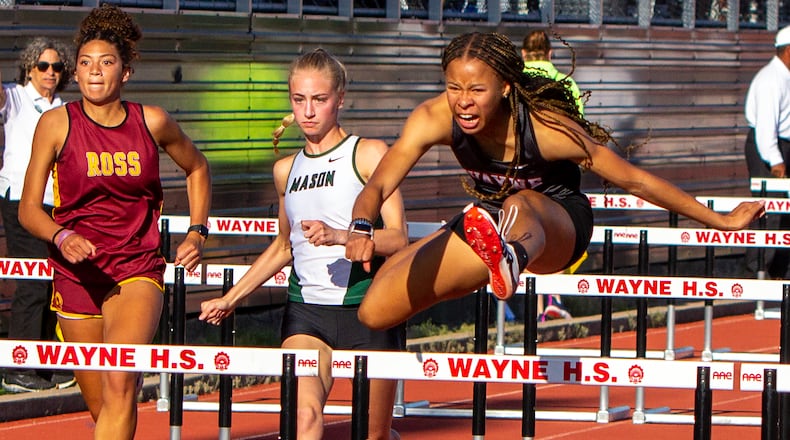 Wayne freshman Ric'Keya White won the 100-meter hurdles in 13.98 seconds to advance to state at Friday's Division I region meet at Wayne High School. White also won the 300 hurdles and was third in the 100. Jeff Gilbert/CONTRIBUTED