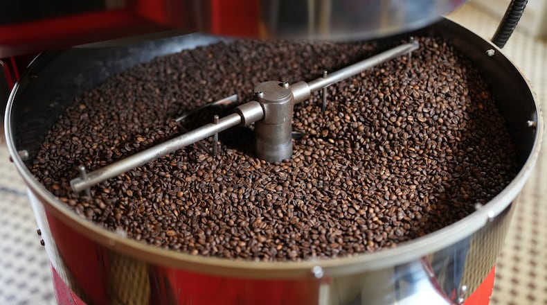 FILE - Coffee beans are prepared at a farm in Braganca Paulista, Brazil, Monday, Aug. 4, 2025. (AP Photo/Andre Penner, File)