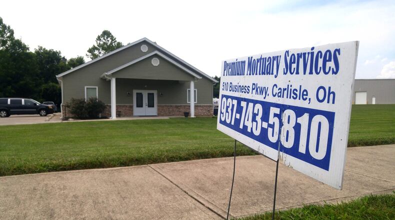 Premium Mortuary Services, a Carlisle-based crematory, had its license revoked earlier this month by the Ohio Board of Embalmers and Funeral Directors after it was cited for 15 violations. The business has now had its license temporarily reinstated. NICK GRAHAM/STAFF