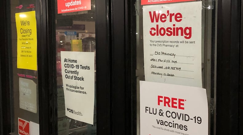 Signs on the door of the CVS Pharmacy at 524 E. Stroop Road in Kettering indicate the store would close on Feb. 10. The store is one of several that has closed in the Dayton area this year.