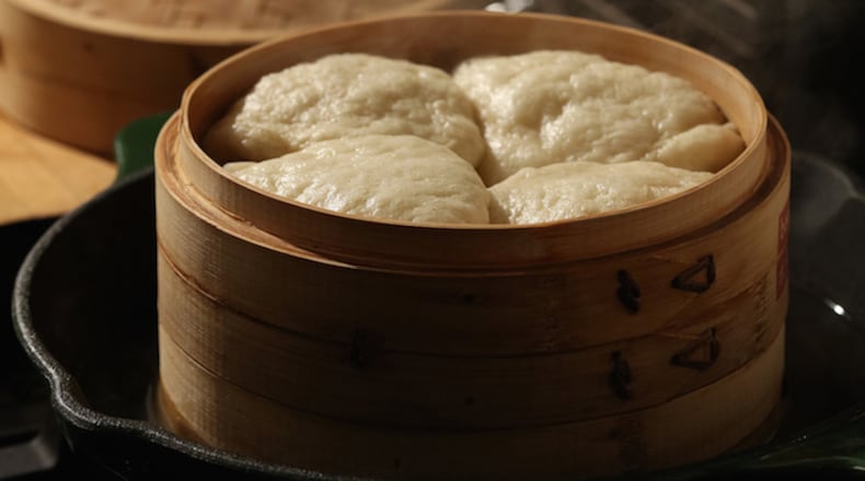 Homemade bao buns can be steamed in a traditional bamboo vessel, or in a more common metal steamer. (E. Jason Wambsgans/Chicago Tribune/TNS)