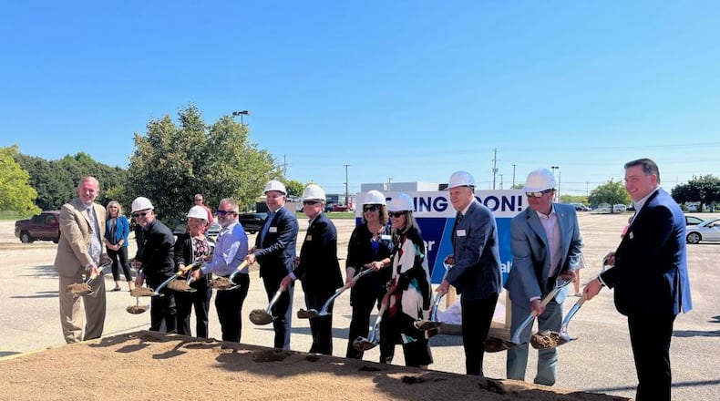 Officials from Kroger, Reid Health and city of Eaton held a ceremony Monday for a new Kroger store in Eaton. CONTRIBUTED