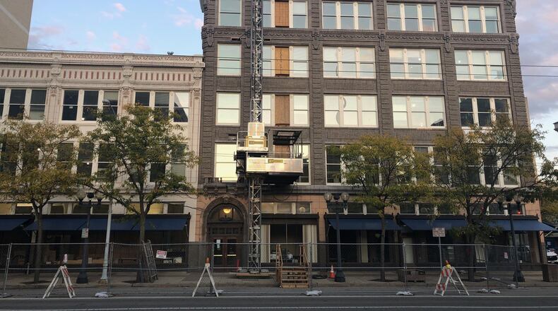 Work continues in October 2019 on the new headquarters complex for Dayton Public Schools, at 124-136 S. Ludlow St., across the street and half a block down from the existing office. JEREMY P. KELLEY / STAFF