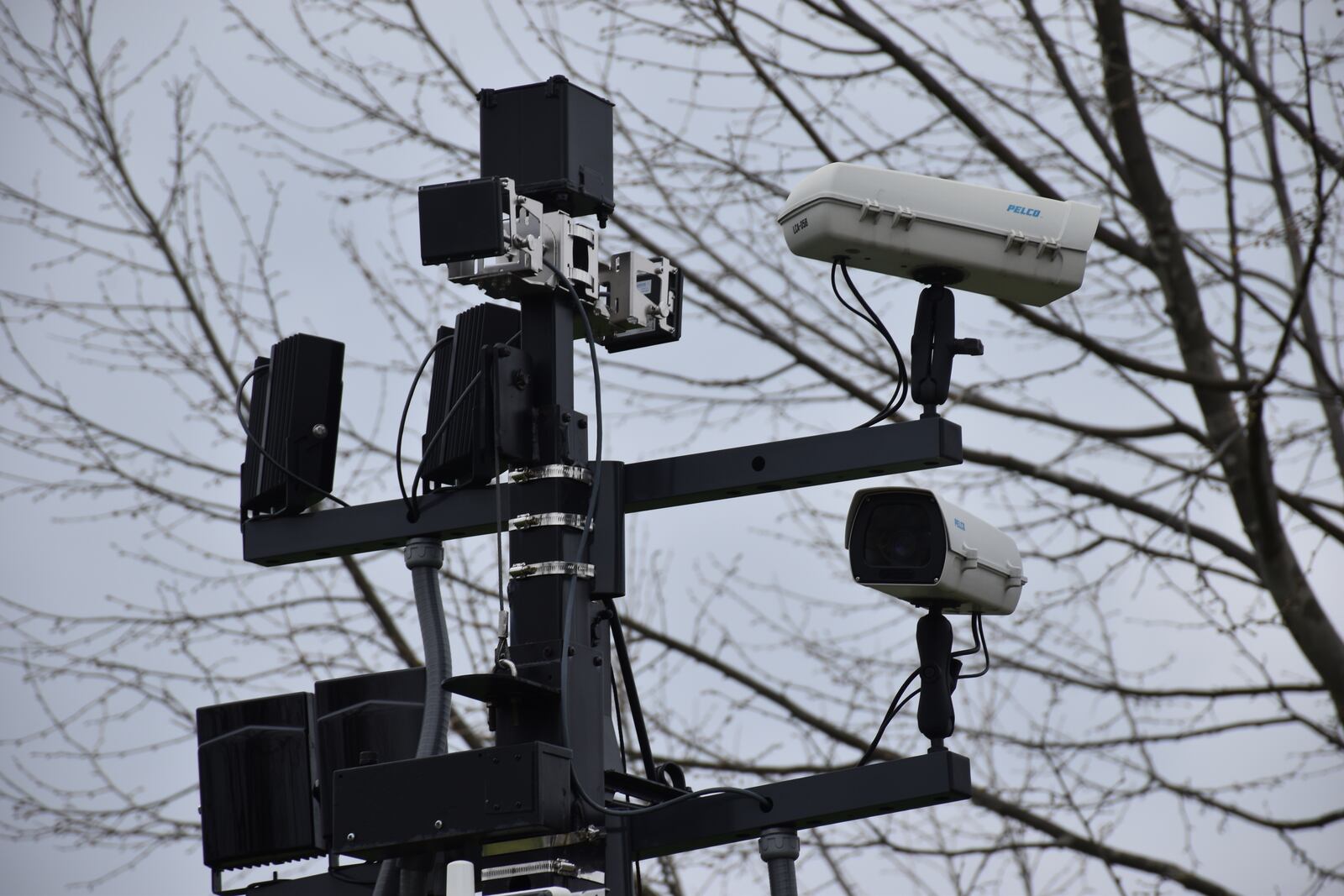 Cameras on top of a mobile speed enforcement trailer in southeast Dayton photographs speeding vehicles and their license plates. CORNELIUS FROLIK / STAFF