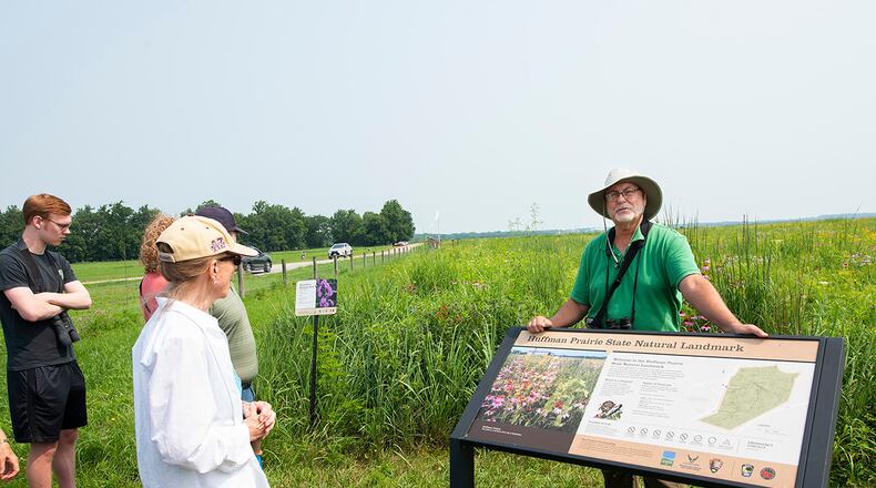 Dave Nolin, retired director of Five Rivers MetroParks, talks about wildflowers and prairies with participants July 19 in a nature walk sponsored by the 88th Civil Engineer Group’s Environmental Branch on Huffman Prairie at Wright-Patterson Air Force Base. The natural prairie, where the Wright brothers learned how to fly, is the largest in the state. U.S. AIR FORCE PHOTO/R.J. ORIEZ