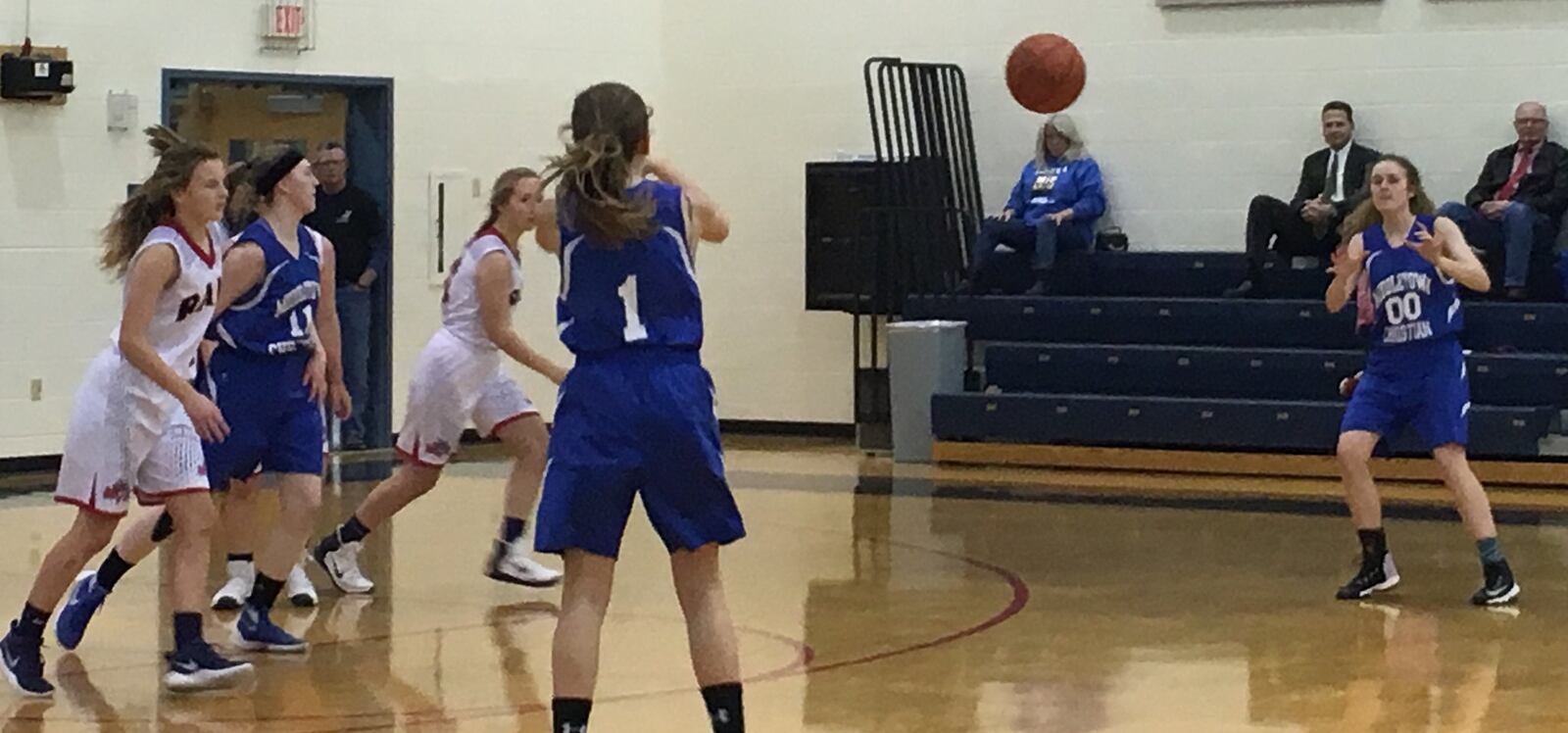Middletown Christian’s Marissa Lykins (1) sends a pass toward teammate Anna Crawford (00) during Thursday night’s game against Miami Valley at Lane Gymnasium in Washington Township. RICK CASSANO/STAFF