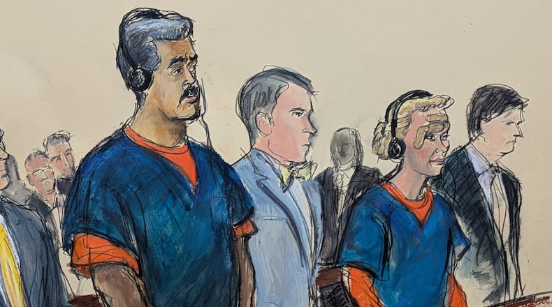 In this courtroom sketch, Venezuelan President Nicolas Maduro, left, and his wife, Cilia Flores, second from right, appear in Manhattan federal court with their defense attorneys Mark Donnelly, second from left, and Andres Sanchez, Monday, Jan. 5, 2026, in New York. (Elizabeth Williams via AP)