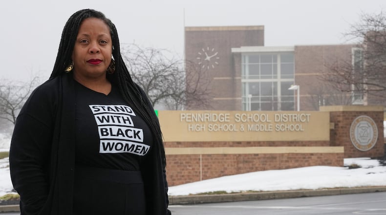 Adrienne King poses for a portrait in front of Pennridge School District's buildings in Perkasie, Pa., Friday, Feb. 20, 2026. (AP Photo/Matt Rourke)