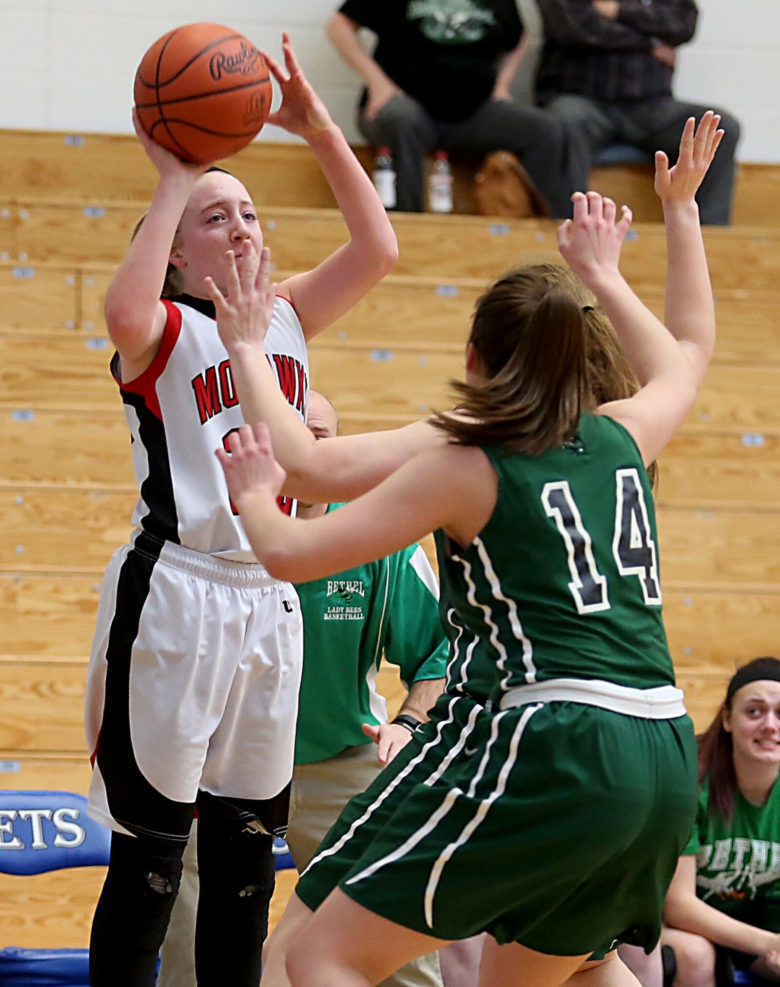 Madison guard Lily Campbell shoots while being double-teamed by Bethel’s Becky Schwieterman and Delaney Hardert (14) during their Division III sectional game at Franklin Monroe on Saturday. CONTRIBUTED PHOTO BY E.L. HUBBARD