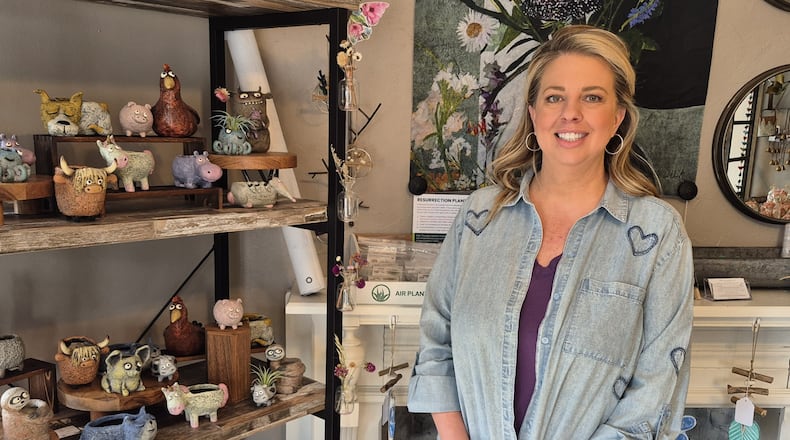 Longtime retail merchandiser Stephanie Schnoor is getting into business for herself with her new store, the Nesting Garden, on Main Street in historic Springboro. MICHAEL KURTZ / STAFF