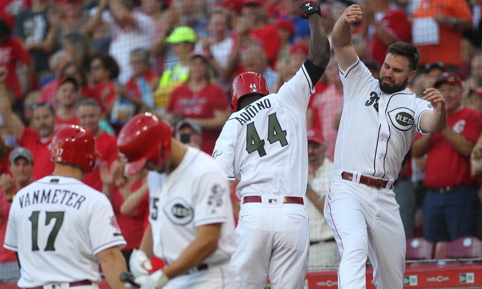 Reds might try rookie sensation Aquino in center field