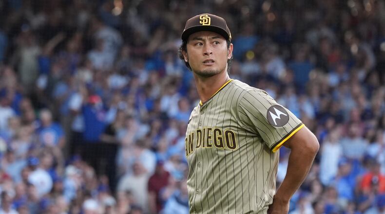 San Diego Padres' Yu Darvish leaves the game during the second inning of Game 3 of a National League wild card baseball game against the Chicago Cubs Thursday, Oct. 2, 2025, in Chicago. (AP Photo/Nam Huh)