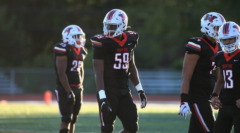 Wayne lineman Aamil Wagner lines up during a game against Springfield on Friday, Sept. 10, 2021, in Huber Heights. David Jablonski/Staff