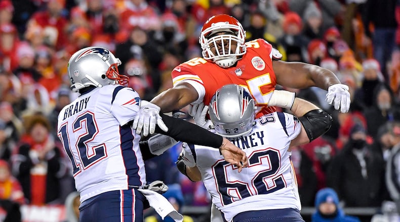 Kansas City Chiefs defensive end Chris Jones couldnât get to New England Patriots quarterback Tom Brady in the second quarter due to the blocking of offensive guard Joe Thuney during the AFC Championship game on Sunday, Jan. 20, 2019 at Arrowhead Stadium in Kansas City, Mo. (John Sleezer/Kansas City Star/TNS)