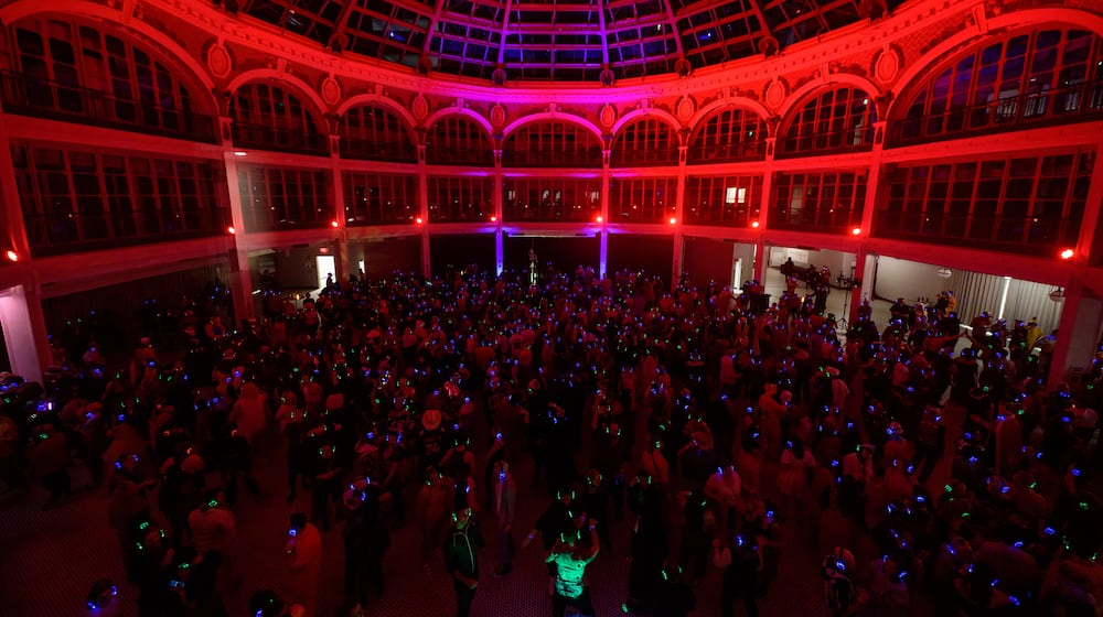 Dayton’s 5th annual Spooky Silent Disco happened at the Dayton Arcade on Friday, Oct. 31, 2025. This month’s silent disco was a Halloween costume party which also featured a costume contest. Attendees were loaned headphones with the capability to change between the green, blue & red stations and adjust the volume. The following DJs were featured: KimL on the green station with EDM, Sexbox on the blue station with '70s, '80s, and '90s and John Chapel on the red station with modern hits. TOM GILLIAM / CONTRIBUTING PHOTOGRAPHER