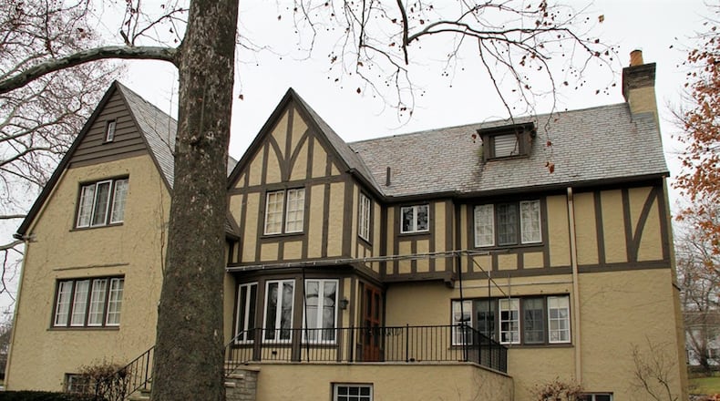 French doors open off the sun room to the slate patio that overlooks the practice field of the Dayton Country Club.