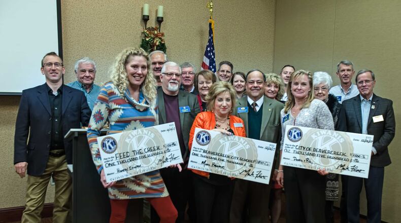 (From left) Sharon Fulcher, Feed the Creek; Jo Ann Rigano, president, Beavercreek Board of Education; Kim Farrell, superintendent, Beavercreek Parks and Recreation with Beavercreek Kiwanis members