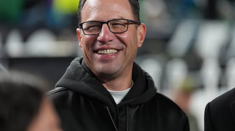 FILE - Pennsylvania Gov. Josh Shapiro watches warm ups before an NFL football game between the Philadelphia Eagles and the Detroit Lions on Sunday, Nov. 16, 2025, in Philadelphia. (AP Photo/Matt Slocum, File)