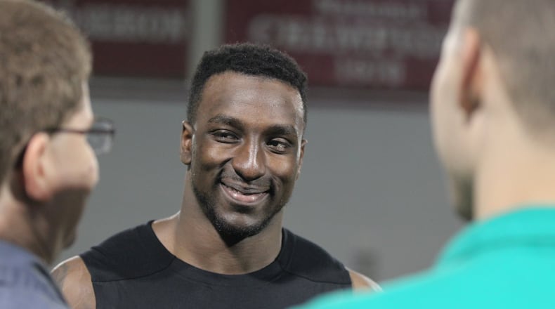 Ohio State’s Bri’onte Dunn talks to reporters after practice on Thursday, March 31, 2016, at the Woody Hayes Athletic Center in Columbus. David Jablonski/Staff
