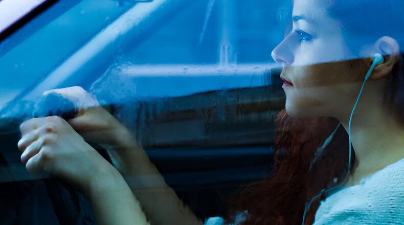 Wearing earbuds while driving is a distraction and increases the chances of an accident. CONTRIBUTED