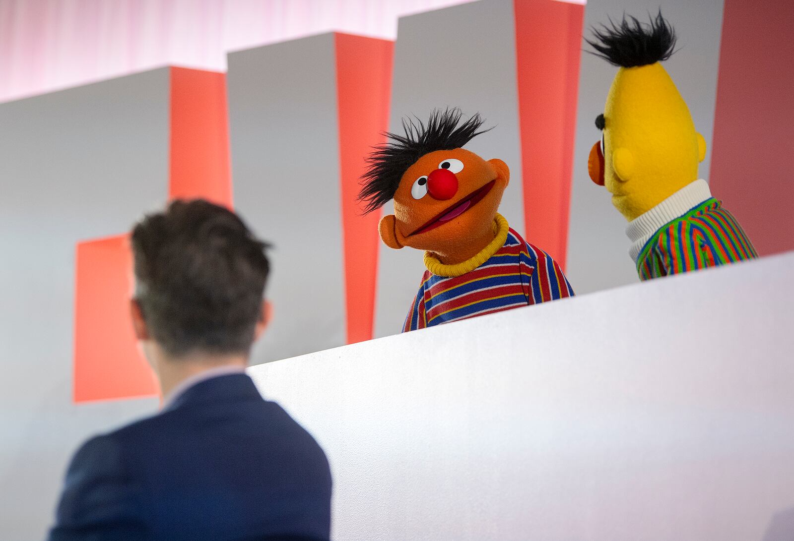 Sesame Street's Bert and Ernie speak with Sal Perez, executive producer and VP of Sesame Street at Sesame Workshop, won the Elevate Prize Foundation's Catalyst Award, Wednesday, May 14, 2025, in Miami Beach, Fla. (AP Photo/Michael Laughlin)