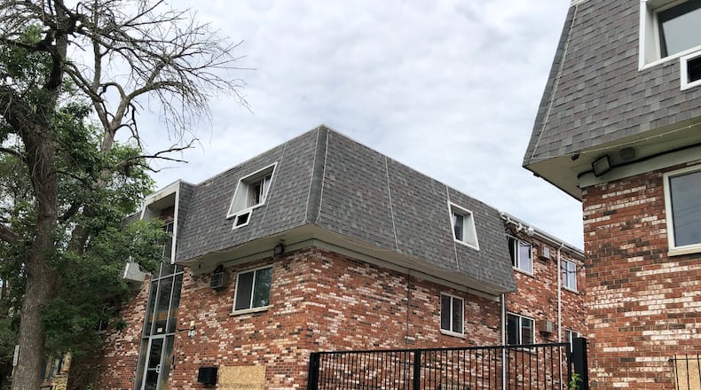 A developer wants to turn vacant buildings on the 600 block of West Grand Avenue into new apartments. CORNELIUS FROLIK / STAFF