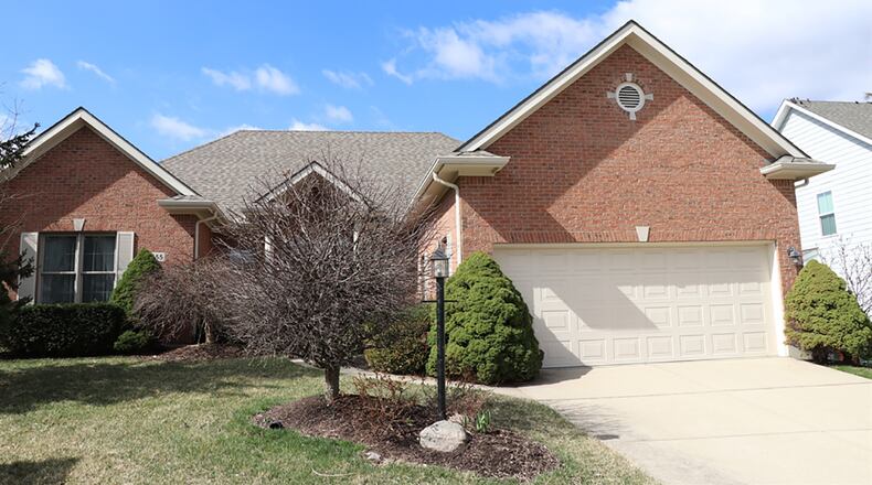 The 3-bedroom home has about 2,195 sq. ft. of living space with a walk-out lower level. The property is nestled within a cul-de-sac with an extra-deep, 2-car garage. CONTRIBUTED PHOTO BY KATHY TYLER