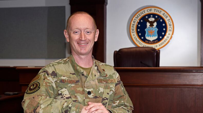 Lt. Col. Dan Watson, chief of Air Force Materiel Command’s Acquisition Law Division, is pictured in the U.S. courtroom at Wright-Patterson Air Force Base on April 20, prior to pinning on the rank of colonel. He began his Air Force career at Wright-Patterson as an enlisted military working dog handler. U.S. AIR FORCE PHOTO/TY GREENLEES