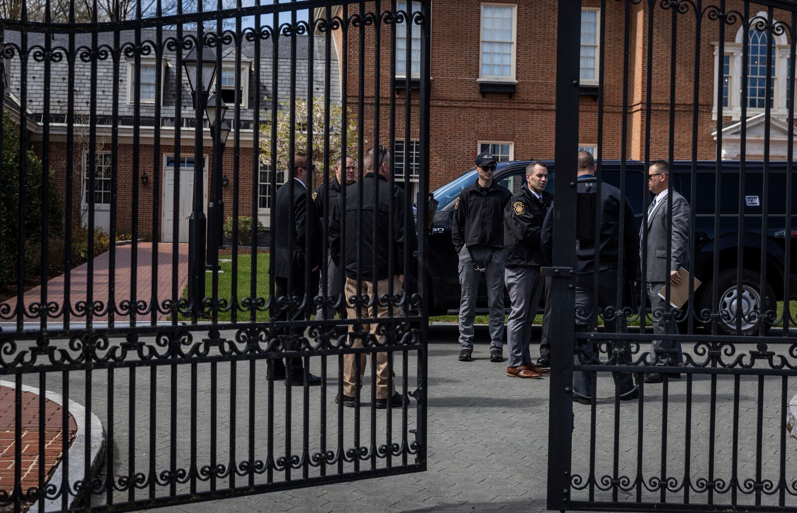 Police investigate Gov. Josh Shapiro's residence after someone set fire to the building on Sunday, April 13, 2025 in Harrisburg, Pa. (Sean Simmers /The Patriot-News via AP)
