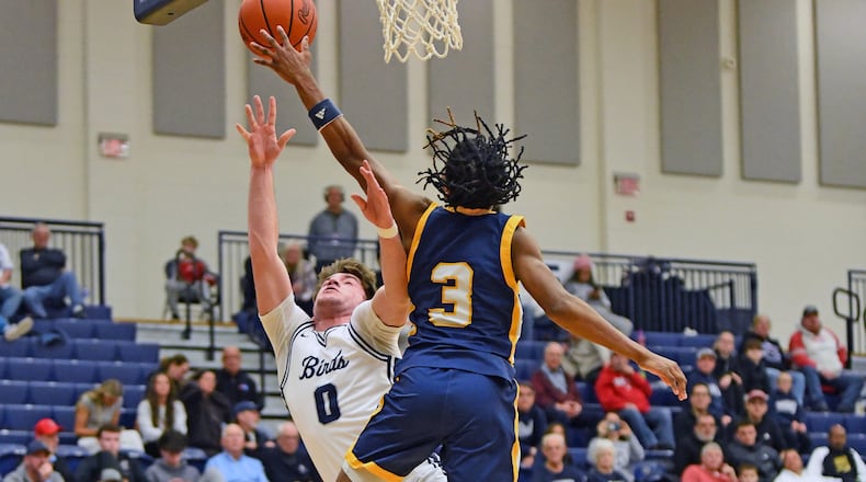 Fairmont senior Nolan Stringer scored 12 points to help the Firebirds defeat Warrensville Heights on Sunday on the final day of Flyin' To The Hoop at Trent Arena. JEFF GILBERT/CONTRIBUTED