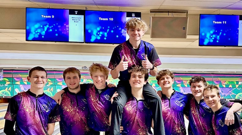 Bellbrook sophomore Jack DeWitt (far left) and senior Landon Fortkamp (center, with Jeremy Reigelsperger on his shoulders) both qualified to the D-I district singles tournament from the first-year Golden Eagles team. CONTRIBUTED