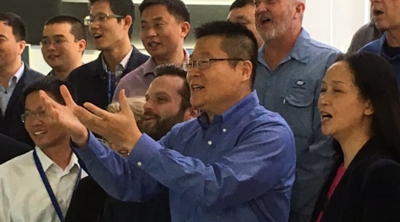 Then-newly named president of Fuyao Glass America, Jeff Liu, joined the company’s Moraine management team in making a video wishing Chinese colleagues a happy Chinese new year in this November 2016 photo. THOMAS GNAU/STAFF