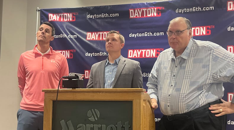 George Janky (right) joined Matt Farrell (left) and Keith Waleskowski at a press conference Oct. 26 announcing the creation of Dayton 6th, a new collective supporting UD athletes in the NIL era.  David Jablonski/Staff