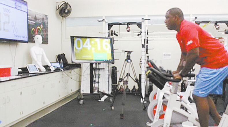 Tech. Sgt. Marty Shorter, bioenvironmental engineering consultant at the U.S. School of Aerospace Medicine, participates in 711th Human Performance Wing research on heart rate. Shorter has on a wearable electronic device that monitors his heart rate while he trains. The wearable electronic device measures how his body adjusts to various intensity levels of cardio training.