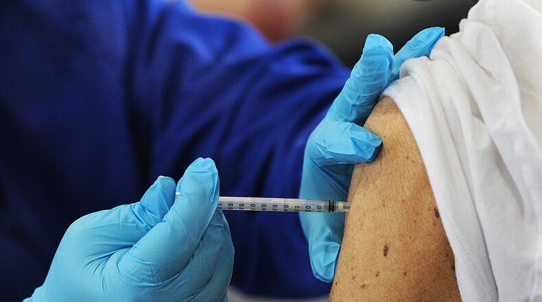 The Kettering Health Network held at vaccine clinic at the Grace United Methodist Church, Thursday, Jan. 28, 2021. MARSHALL GORBY\STAFF